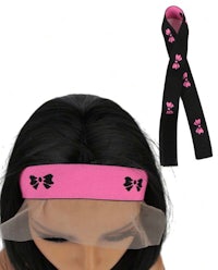 a black headband with pink bows on it